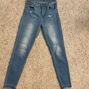 Levi’s size 26 high rise skinny jeans, raw hem